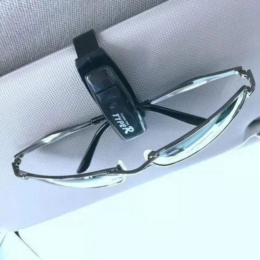 Clip sujetador de lentes para autos